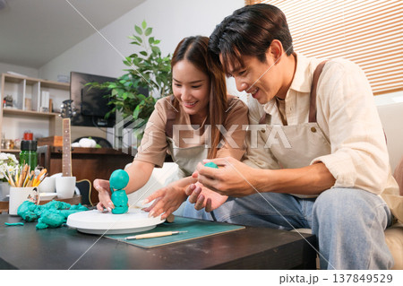 A young Asian couple spend time together at home 137849529