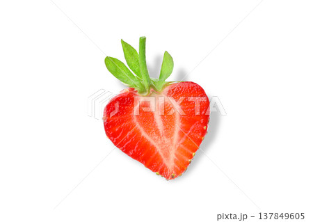 Cut strawberry shows heart shape and green leaves, PNG 137849605
