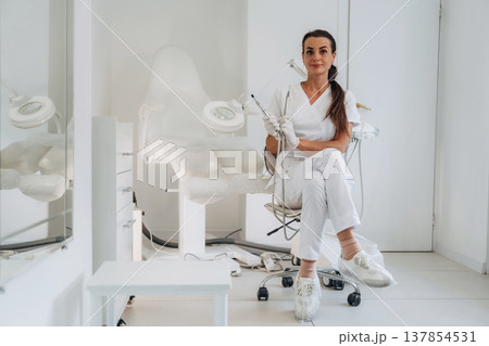 Ready for work. Podiatrist is in the clinic with equipment Ready for work. Podiatrist is in the clinic with equipment 137854531