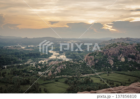 View of mountains and Tungabhadra river in Hampi, India View of mountains and Tungabhadra river in Hampi, India 137856810