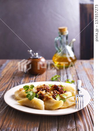 closeup of traditional ukrainian food - dumplings varenik closeup of traditional ukrainian food - dumplings varenik 137857273