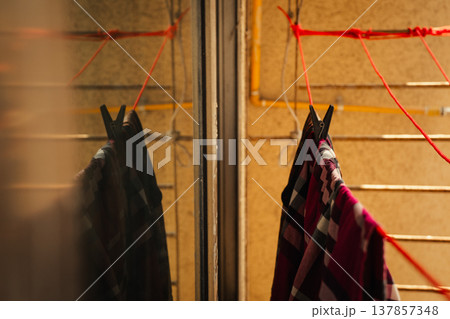Laundry on the clothespin. Clothes drying on the sun Laundry on the clothespin. Clothes drying on the sun 137857348