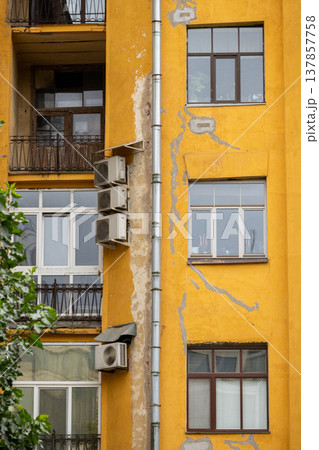 air conditioning on facade of building, air cooling in hot weather.  137857758