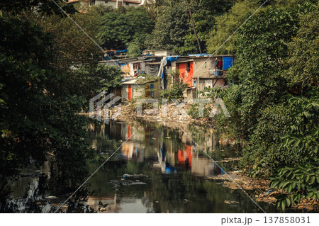 Big slums in the Mumbai, India. Streets full of people Big slums in the Mumbai, India. Streets full of people 137858031