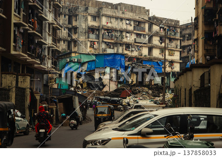 Big slums in the Mumbai, India. Streets full of people Big slums in the Mumbai, India. Streets full of people 137858033