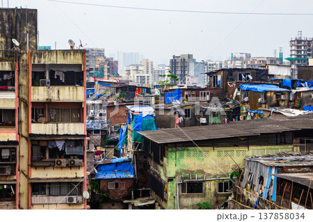 Big slums in the Mumbai, India. Streets full of people Big slums in the Mumbai, India. Streets full of people 137858034