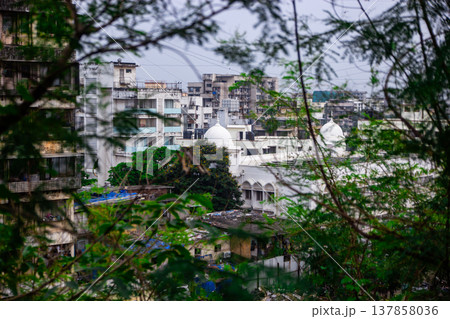 Big slums in the Mumbai, India. Streets full of people Big slums in the Mumbai, India. Streets full of people 137858036