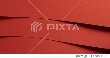Horizontal red paper bands create a bold layered background with graphic rhythm. Smooth matte strips Horizontal red paper bands create a bold layered background with graphic rhythm. Smooth matte strips 137859626