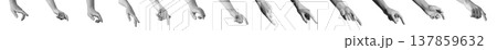Left hand reaches forward with outstretched index finger in closeup perspective. Gesture indicates 137859632
