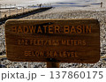 A Wooden Sign in Badwater Basin in Death Valley Showing Below Sea Level Depth 137860175