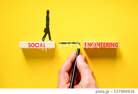 Social engineering words symbol. Concept words Social engineering on beautiful wooden blocks. Beautiful yellow background. Businessman hand. Business and Social engineering words concept. Copy space. Social engineering words symbol. Concept words Social engineering on beautiful wooden blocks. Beautiful yellow background. Businessman hand. Business and Social engineering words concept. Copy space. 137860816
