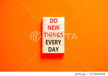 Do new things every day words symbol. Concept words Do new things every day on beautiful wooden blocks. Beautiful orange paper background. Business do new things every day concept. Copy space. Do new things every day words symbol. Concept words Do new things every day on beautiful wooden blocks. Beautiful orange paper background. Business do new things every day concept. Copy space. 137860846