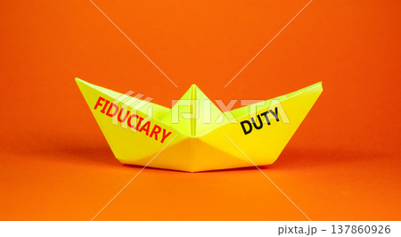 Fiduciary duty words symbol. Concept words Fiduciary duty on beautiful yellow paper boat. Beautiful orange background. Business and Fiduciary duty words concept. Copy space. 137860926