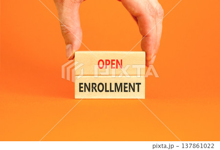 Open enrollment words symbol. Concept words Open enrollment on beautiful wooden blocks. Beautiful orange background. Doctor hand. Medical and Open enrollment words concept. Copy space. Open enrollment words symbol. Concept words Open enrollment on beautiful wooden blocks. Beautiful orange background. Doctor hand. Medical and Open enrollment words concept. Copy space. 137861022