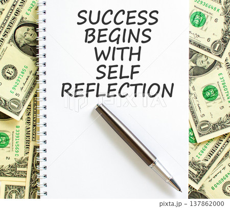 Self reflection symbol. Concept words Success begins with self reflection on beautiful white note. Beautiful dollar bills background. Business success begins with self reflection concept. Copy space. 137862000