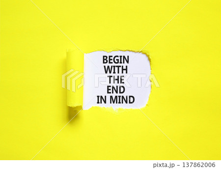 Begin with the end in mind symbol. Concept words Begin with the end in mind on beautiful white paper. Beautiful yellow paper background. Business begin with the end in mind concept. Copy space. 137862006