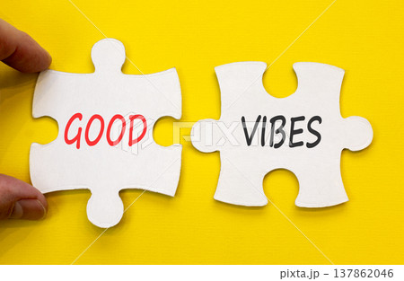 Good vibes words symbol. Concept words Good vibes on beautiful white puzzles. Beautiful yellow background. Businessman hand. Business lifestyle and Good vibes words concept. Copy space. 137862046