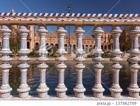 Ceramic bridge and Plaza de Espana in Seville under blue sky Spain 137862709