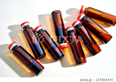 Amber glass vials containing liquid medicine treatment 137864435