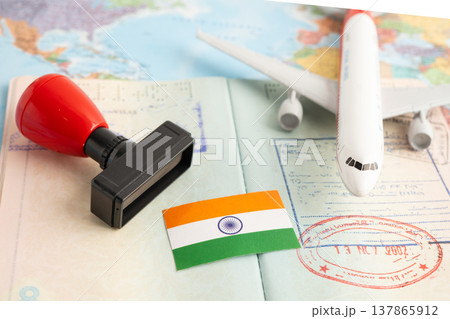 India flag with passport and airplane for travel. India flag with passport and airplane for travel. 137865912