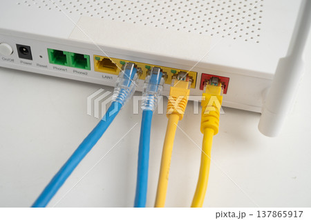 Ethernet cable with wireless router connect to internet service provider network. Ethernet cable with wireless router connect to internet service provider network. 137865917