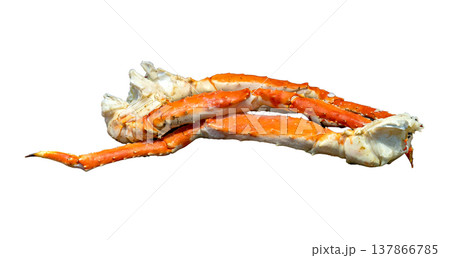 Cooked Alaskan king crab legs isolated on white background. Premium fresh seafood with bright orange and red spiny shells. High quality gourmet ingredient for luxury dining and restaurant menus. 137866785