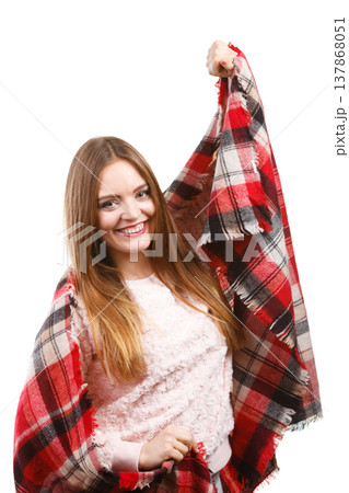 Woman wearing warm scarf warming herself up Woman wearing warm scarf warming herself up 137868051