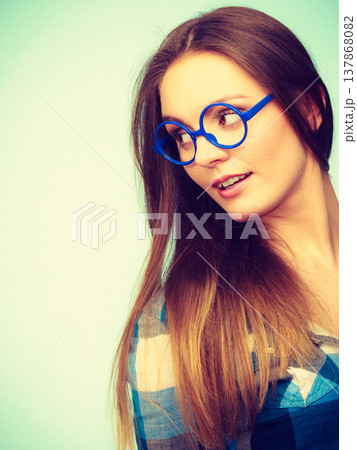 Attractive nerdy woman in weird glasses 137868082