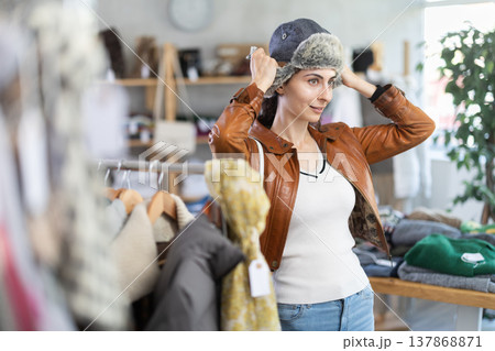 Armenian woman chooses a gray fur hat 137868871