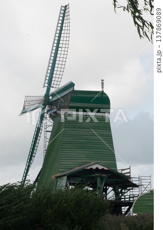 Traditional wooden wildmill at Zaanse Schans, Zaandam, Netherlands 137869089