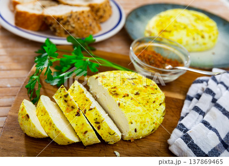 Fried cottage cheese with turmeric. Traditional Lithuanian dish Fried cottage cheese with turmeric. Traditional Lithuanian dish 137869465