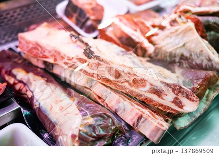 Chopped beef meat in metal trays displayed for sale 137869509