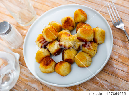 Fried cheese croquettes with crispy crust and soft filling 137869656