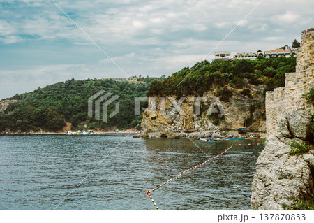 Amazing view of the Adriatic sea near Budva. Beautiful cloudy sky. Amazing view of the Adriatic sea near Budva. Beautiful cloudy sky. 137870833