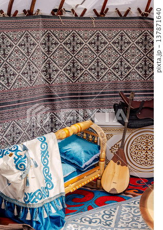 Decorative Textile Display. Intricate Fabric Wall Showcasing Traditional Craftsmanship 137871640