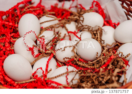 Eggs With Decorative Filler. Closeup Of Eggs Surrounded By Natural Shredded Filler Material 137871757