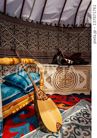 Dwelling With Music. Traditional Nomadic Home Featuring Musical Tools And Artisanal Furniture Dwelling With Music. Traditional Nomadic Home Featuring Musical Tools And Artisanal Furniture 137871761