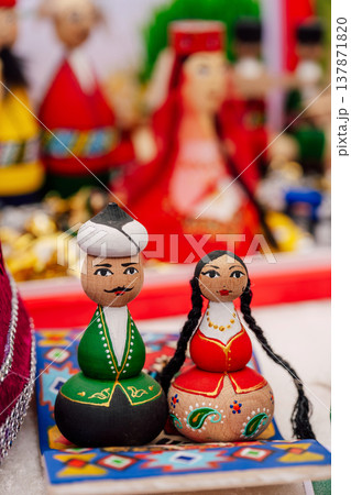 Collection Of Artistically Painted Wooden Dolls Emphasizing Cultural Heritage Measures 137871820