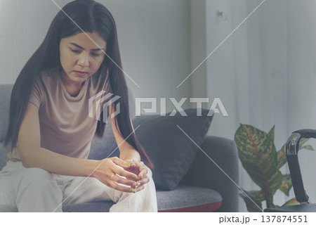 Recession Stress Woman work hard at home office headache depressed failure business burnout sitting on sofa. Tired Asian woman despair stress overworked frustration pain panic depression life crisis Recession Stress Woman work hard at home office headache depressed failure business burnout sitting on sofa. Tired Asian woman despair stress overworked frustration pain panic depression life crisis 137874551
