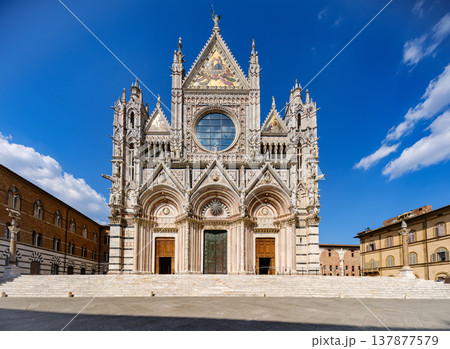 Discover the Atmosphere of Siena Cathedral and Historic Piazza del Duomo.The historic piazza and cathedral create a timeless travel scene with soft movement and cultural identity. Discover the Atmosphere of Siena Cathedral and Historic Piazza del Duomo.The historic piazza and cathedral create a timeless travel scene with soft movement and cultural identity. 137877579