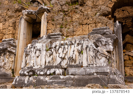 Marble reliefs decorating Roman theater in ancient city of Perga, Turkey Marble reliefs decorating Roman theater in ancient city of Perga, Turkey 137878543