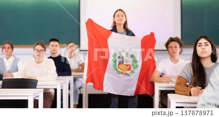 Young girl student diligently studies at school 137878971