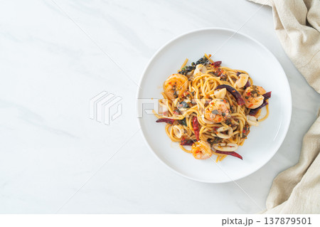 spicy spaghetti seafood on plate 137879501