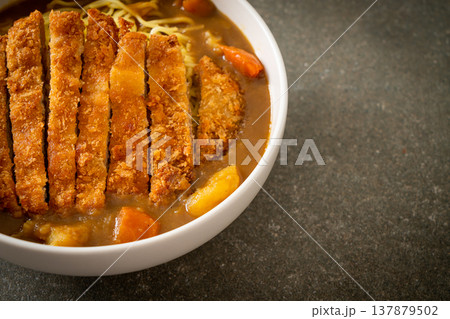 curry ramen noodles with tonkatsu fried pork cutlet curry ramen noodles with tonkatsu fried pork cutlet 137879502
