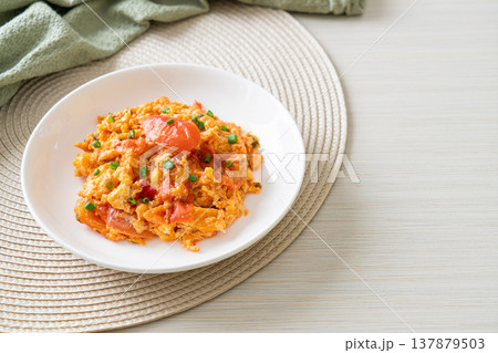 Stir-fried tomatoes with egg or Scrambled eggs with tomatoes 137879503