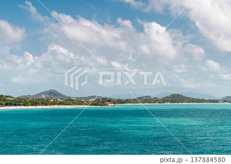 Turquoise sea and rocky tropical coastline view over Chaweng Noi bay toward Chaweng Beach on Koh Samui island Thailand Turquoise sea and rocky tropical coastline view over Chaweng Noi bay toward Chaweng Beach on Koh Samui island Thailand 137884580