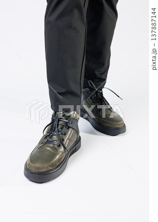 New stylish men's autumn boots made of genuine leather, men's footwear on a white background. Winter men's shoes 2022 New stylish men's autumn boots made of genuine leather, men's footwear on a white background. Winter men's shoes 2022 137887144