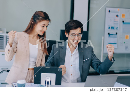 Group of business people and software developers working as a team in office Group of business people and software developers working as a team in office 137887347