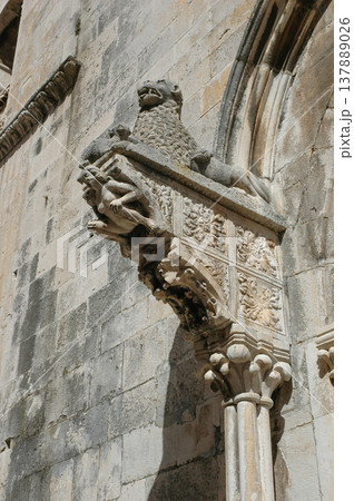Stone Lion and Humanoid Figure on Saint Marks Cathedral in Korcula 137889026