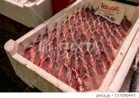 Genoa, liguria, italy. May 18, 2024. Freshly cleaned and filleted anchovies displayed for sale on ice, offering a healthy mediterranean diet food option Genoa, liguria, italy. May 18, 2024. Freshly cleaned and filleted anchovies displayed for sale on ice, offering a healthy mediterranean diet food option 137890443
